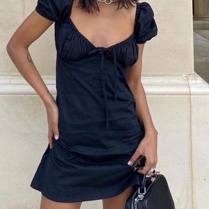 With jean Audrey dress in black